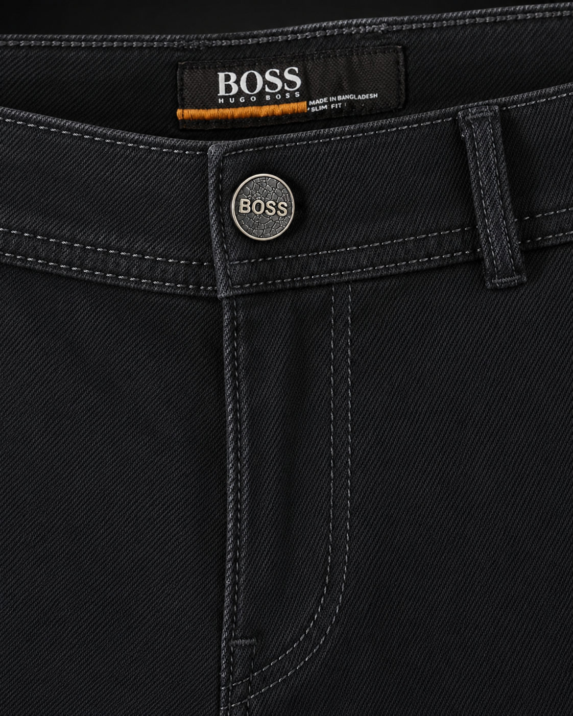 Détail ceinture bouton gravé jean slim fit Hugo Boss noir — Zalimi Sénégal